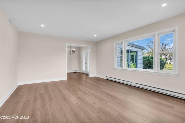 377 Old Nassau Rd Unit 377B, Monroe, NJ 08831 - spare room featuring a baseboard radiator, a chandelier, wood finished floors, and recessed lighting