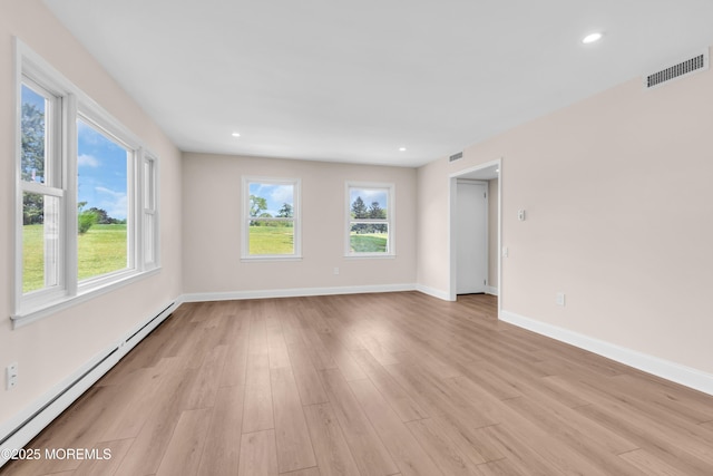 377 Old Nassau Rd Unit 377B, Monroe, NJ 08831 - empty room featuring baseboard heating, light wood finished floors, and recessed lighting