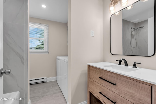 377 Old Nassau Rd Unit 377B, Monroe, NJ 08831 - full bathroom featuring baseboard heating, washer and dryer, vanity, a shower, and tile patterned floors