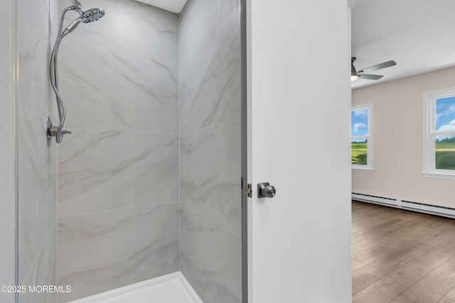 377 Old Nassau Rd Unit 377B, Monroe, NJ 08831 - full bath with a marble finish shower, wood finished floors, a ceiling fan, and a baseboard heating unit