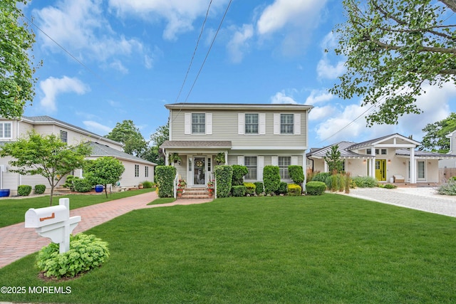 217 Howe St, Point Pleasant, NJ 08742 - view of front of home featuring a front lawn