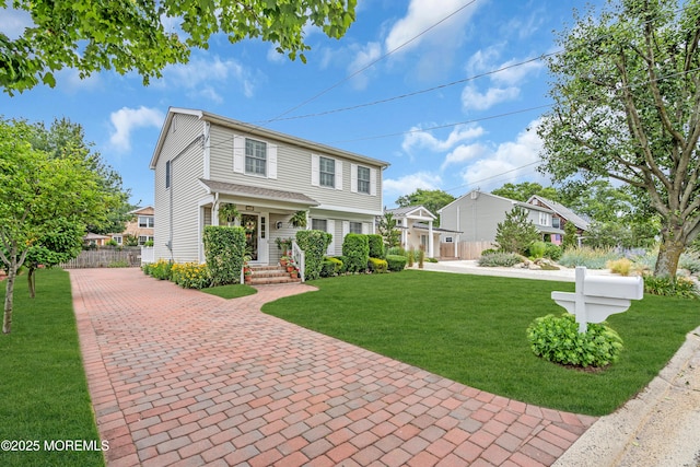 217 Howe St, Point Pleasant, NJ 08742 - view of front of house featuring decorative driveway