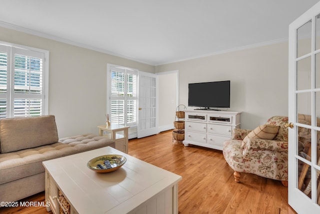 217 Howe St, Point Pleasant, NJ 08742 - living room with crown molding and light wood-style floors