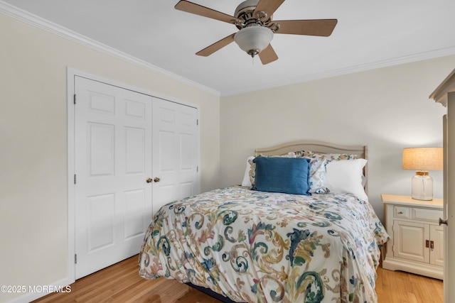 217 Howe St, Point Pleasant, NJ 08742 - bedroom with light wood-style flooring, crown molding, a closet, and a ceiling fan