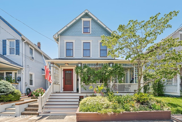 132 Cookman Ave, Ocean Grove, NJ 07756 - victorian-style house featuring a porch
