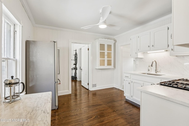 132 Cookman Ave, Ocean Grove, NJ 07756 - kitchen featuring freestanding refrigerator, ornamental molding, light countertops, and white cabinets