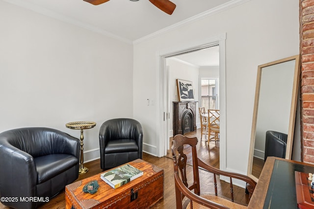 132 Cookman Ave, Ocean Grove, NJ 07756 - living area with wood finished floors, ornamental molding, and a ceiling fan