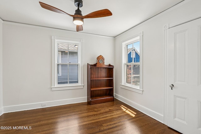 132 Cookman Ave, Ocean Grove, NJ 07756 - spare room with dark wood finished floors, ceiling fan, plenty of natural light, and crown molding