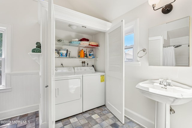 132 Cookman Ave, Ocean Grove, NJ 07756 - laundry room with washer and dryer and stone finish floors