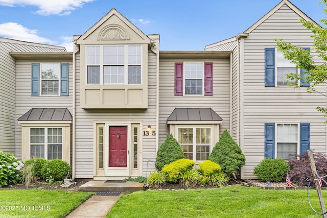 13 Stuart Dr Unit 5, Freehold, NJ 07728 - multi unit property with a standing seam roof, a front yard, and a metal roof