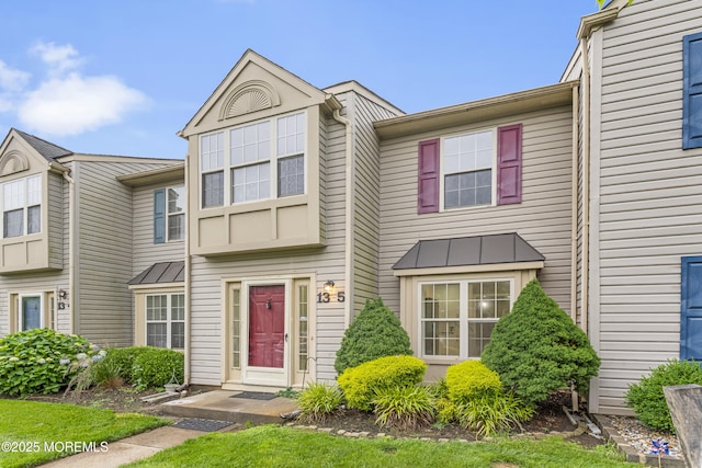 13 Stuart Dr Unit 5, Freehold, NJ 07728 - view of property featuring a standing seam roof and a metal roof