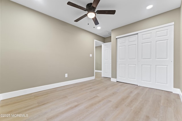 13 Stuart Dr Unit 5, Freehold, NJ 07728 - unfurnished bedroom with light wood finished floors, a closet, recessed lighting, and a ceiling fan