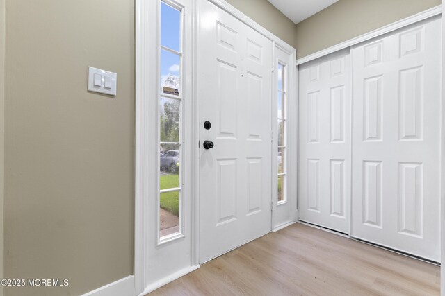 13 Stuart Dr Unit 5, Freehold, NJ 07728 - foyer featuring healthy amount of natural light and light wood finished floors