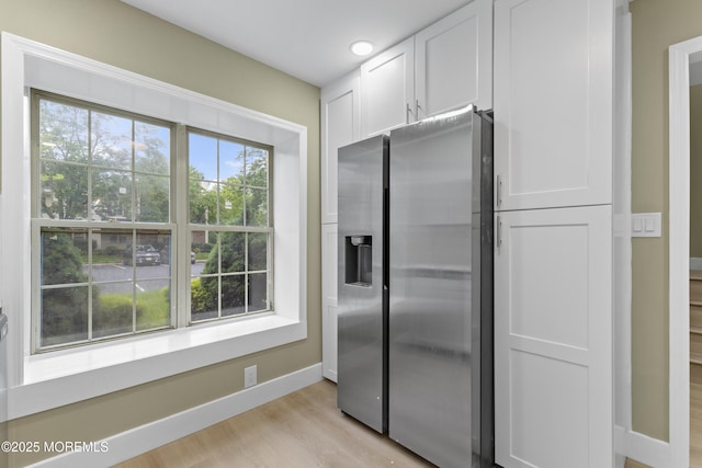 13 Stuart Dr Unit 5, Freehold, NJ 07728 - kitchen featuring stainless steel fridge with ice dispenser, white cabinets, and light wood finished floors