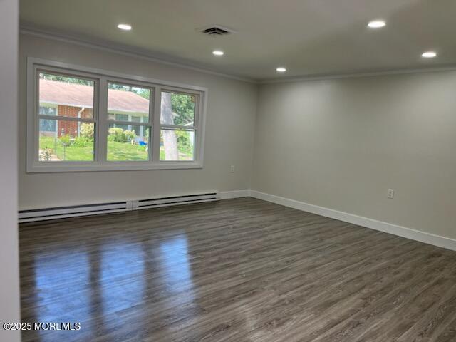 482C Thornbury Ct, Lakewood, NJ 08701 - unfurnished room featuring ornamental molding, a baseboard radiator, dark wood-style floors, and recessed lighting
