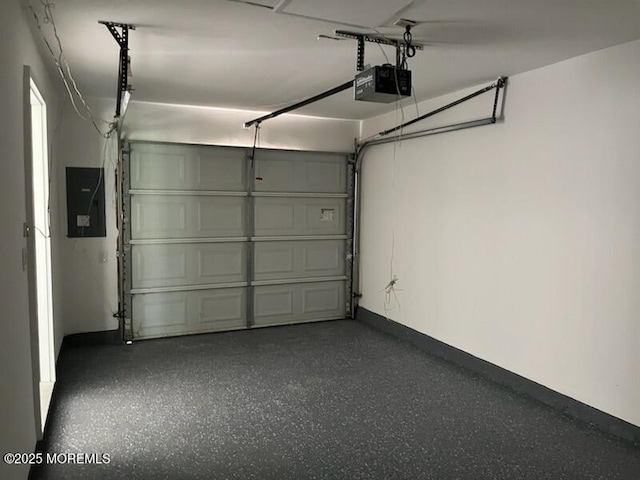 482C Thornbury Ct, Lakewood, NJ 08701 - garage with a garage door opener and electric panel