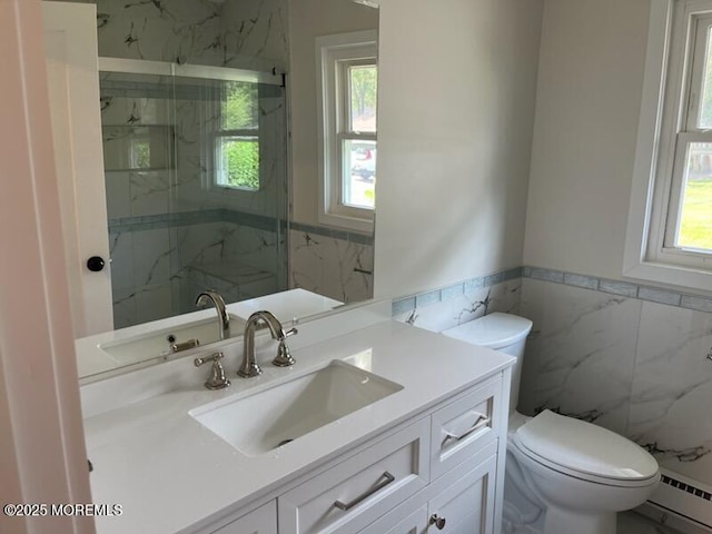 482C Thornbury Ct, Lakewood, NJ 08701 - full bathroom featuring tile walls, a baseboard radiator, plenty of natural light, a marble finish shower, and vanity