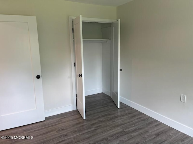 482C Thornbury Ct, Lakewood, NJ 08701 - unfurnished bedroom featuring dark wood finished floors and a closet