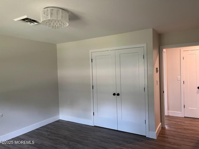 482C Thornbury Ct, Lakewood, NJ 08701 - unfurnished bedroom featuring dark wood finished floors and a closet