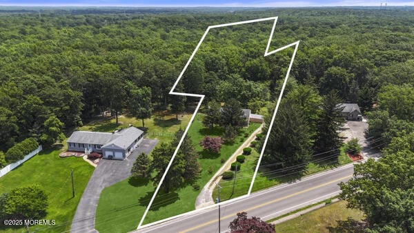 801 Harmony Rd, Jackson, NJ 08527 - aerial view of property and surrounding area featuring a heavily wooded area and property parcel outlined