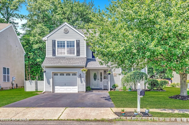 27 Skyline Dr, Hazlet, NJ 07730 - view of front facade featuring an attached garage, asphalt driveway, and a shingled roof