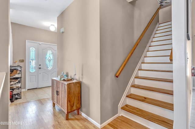 27 Skyline Dr, Hazlet, NJ 07730 - entryway featuring stairway and light wood finished floors