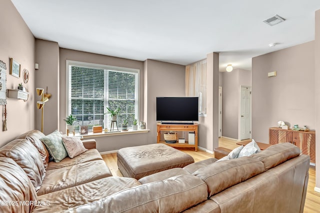 27 Skyline Dr, Hazlet, NJ 07730 - living area featuring light wood finished floors and baseboards
