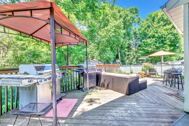 27 Skyline Dr, Hazlet, NJ 07730 - wooden deck featuring a grill, an outdoor hangout area, outdoor dining area, and view of scattered trees