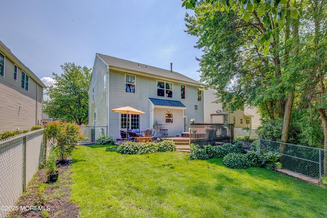 27 Skyline Dr, Hazlet, NJ 07730 - back of house with a wooden deck and a fenced backyard