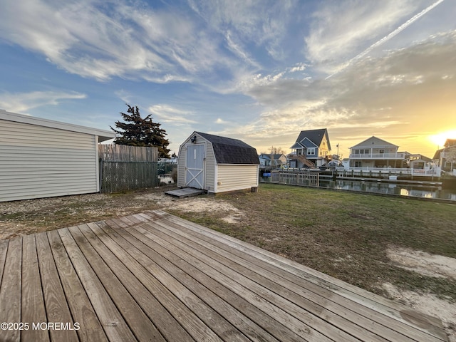 58 W Anchor Dr, Little Egg Harbor, NJ 08087 - deck at dusk with a shed and a water view