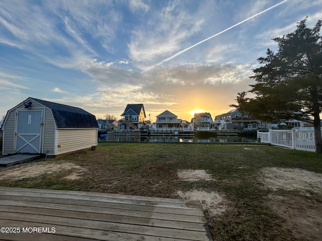 58 W Anchor Dr, Little Egg Harbor, NJ 08087 - view of yard with a shed and a deck with water view