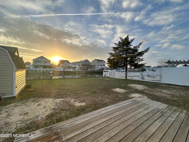 58 W Anchor Dr, Little Egg Harbor, NJ 08087 - fenced backyard featuring a deck with water view and a residential view
