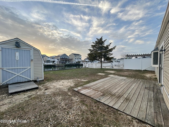 58 W Anchor Dr, Little Egg Harbor, NJ 08087 - fenced backyard with a shed and a deck with water view