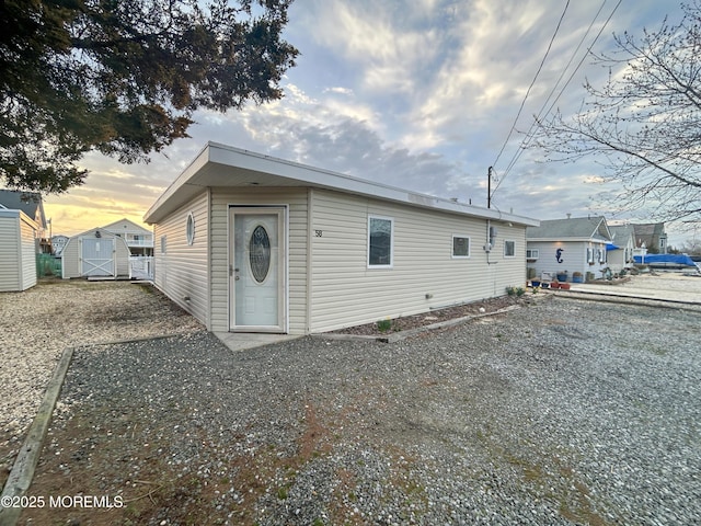 58 W Anchor Dr, Little Egg Harbor, NJ 08087 - view of front of home featuring a storage unit