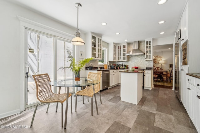 11 Delwood Rd, Chester Twp, NJ 07930 - kitchen featuring wall chimney exhaust hood, stainless steel appliances, a center island, dark countertops, and recessed lighting