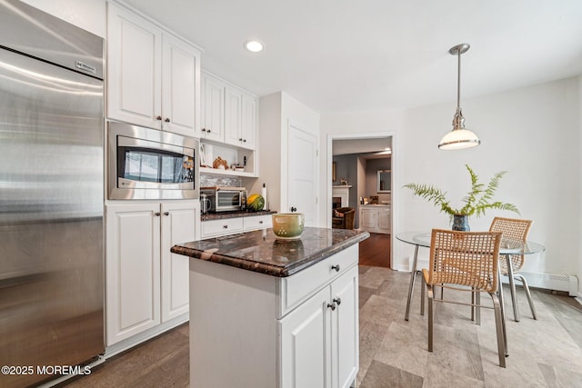 11 Delwood Rd, Chester Twp, NJ 07930 - kitchen featuring built in appliances, a kitchen island, white cabinetry, pendant lighting, and recessed lighting
