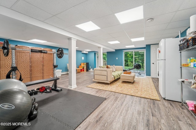 11 Delwood Rd, Chester Twp, NJ 07930 - workout area featuring wood finished floors, ornate columns, and a paneled ceiling