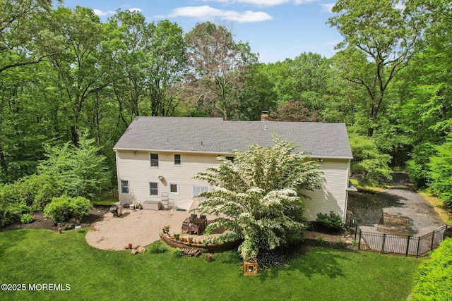 11 Delwood Rd, Chester Twp, NJ 07930 - back of property with a patio, a chimney, and roof with shingles