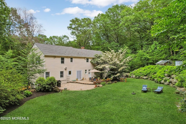 11 Delwood Rd, Chester Twp, NJ 07930 - back of property featuring a patio, a yard, and a chimney