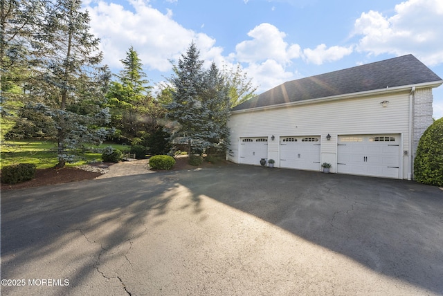 320 Sinclair Ct, Morganville, NJ 07751 - garage featuring driveway