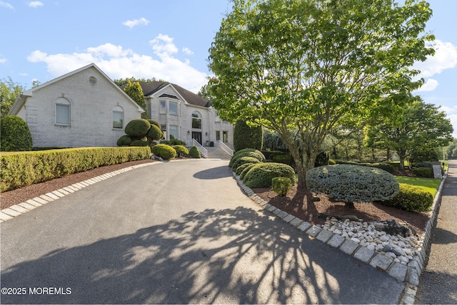 320 Sinclair Ct, Morganville, NJ 07751 - view of front of home with brick siding