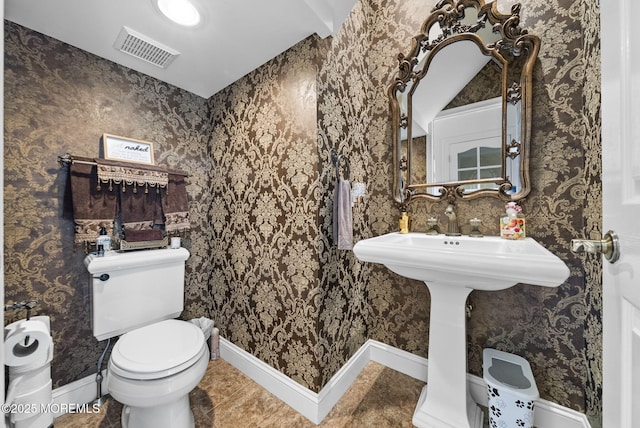 320 Sinclair Ct, Morganville, NJ 07751 - half bathroom featuring toilet and tile patterned floors