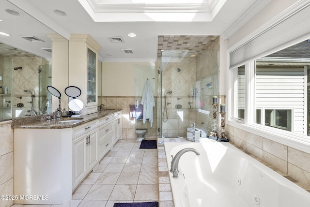 320 Sinclair Ct, Morganville, NJ 07751 - bathroom featuring a stall shower, a jetted tub, vanity, crown molding, and tile walls