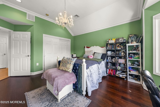 320 Sinclair Ct, Morganville, NJ 07751 - bedroom featuring a chandelier, ornamental molding, hardwood / wood-style flooring, a closet, and lofted ceiling