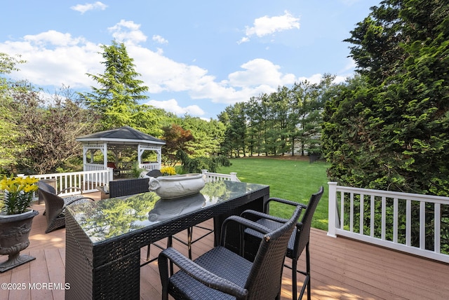 320 Sinclair Ct, Morganville, NJ 07751 - deck with a gazebo, outdoor dining space, a yard, and view of scattered trees