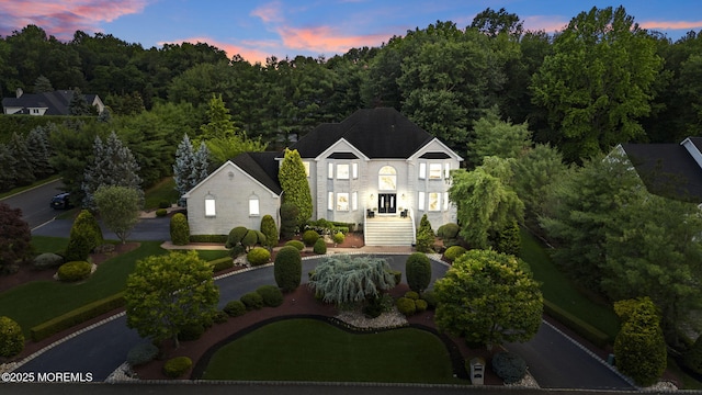 320 Sinclair Ct, Morganville, NJ 07751 - aerial view at dusk of a forest view