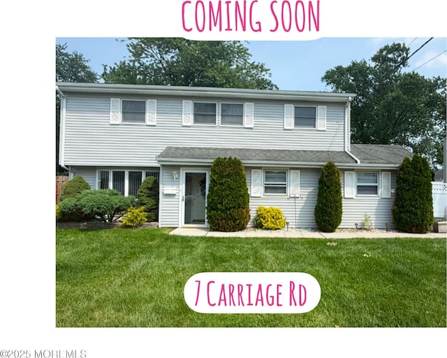 7 Carriage Rd, Hazlet, NJ 07730 - view of front facade featuring a front lawn