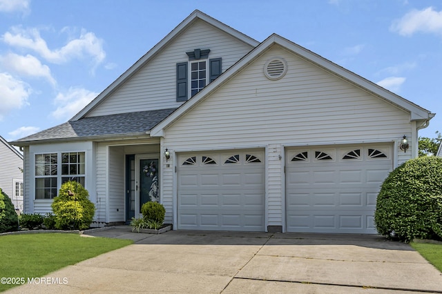 18 Stewart Ct, Jackson, NJ 08527 - traditional-style home featuring driveway, an attached garage, and a shingled roof