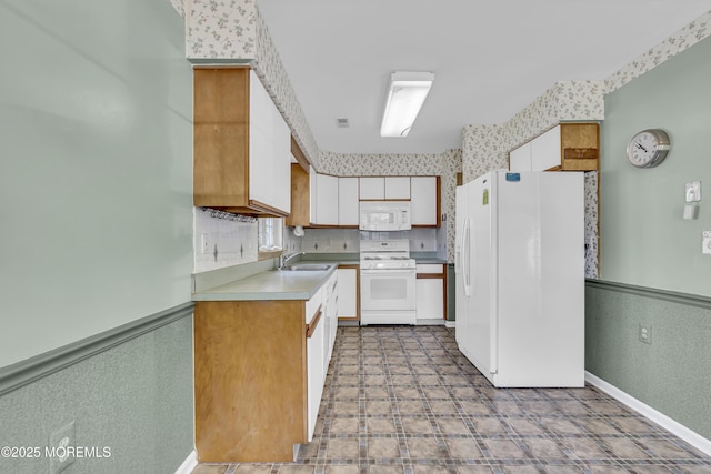 18 Stewart Ct, Jackson, NJ 08527 - kitchen with white appliances, light flooring, light countertops, white cabinetry, and backsplash