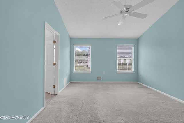 18 Stewart Ct, Jackson, NJ 08527 - spare room featuring a textured ceiling, carpet floors, ceiling fan, and lofted ceiling
